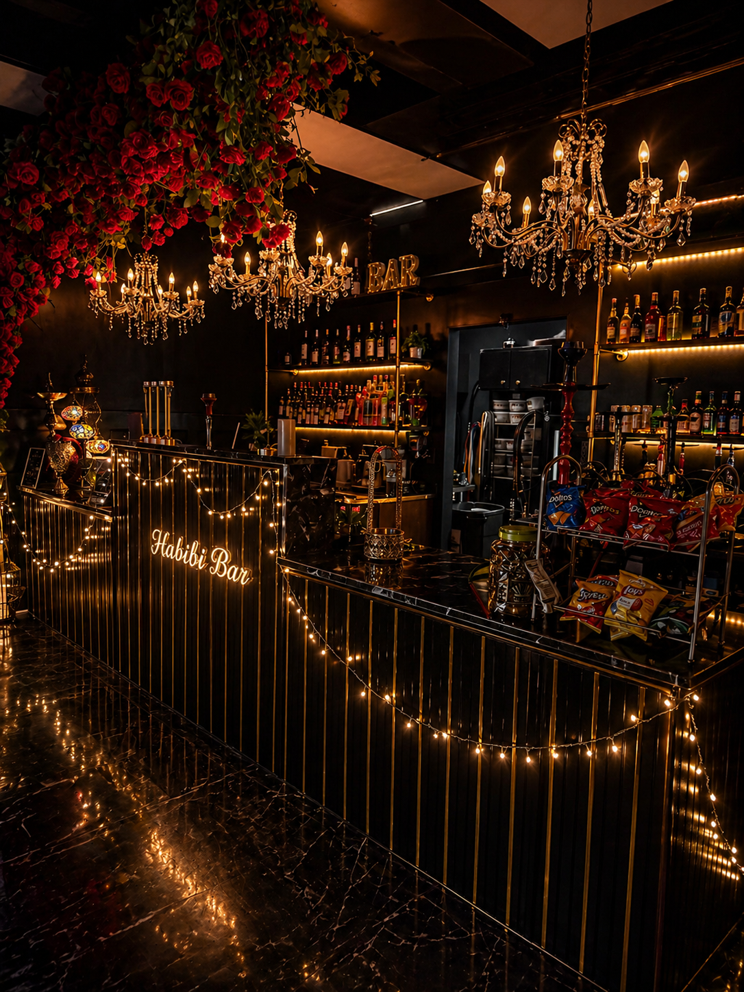 Habibi Bar with chandeliers and red roses