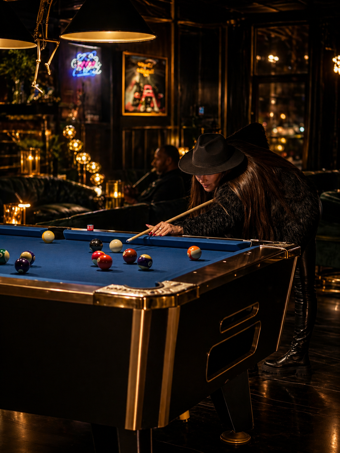 Guest playing pool in the back lounge